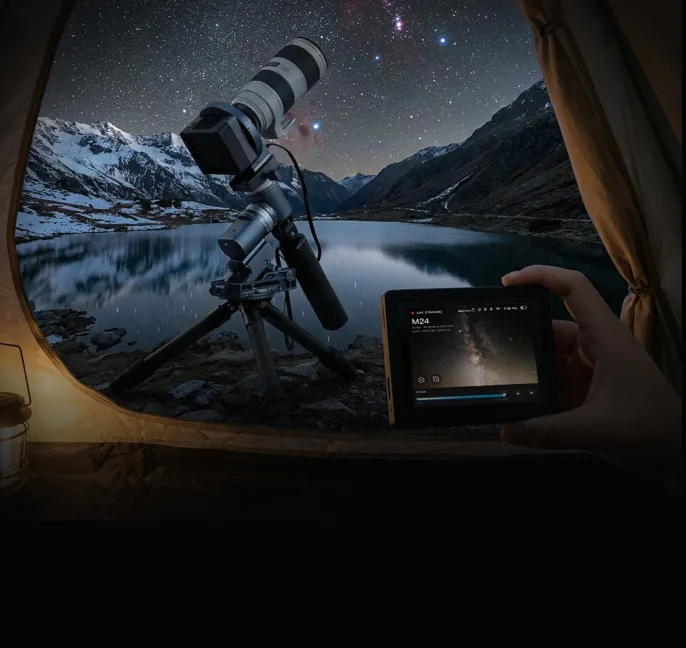 Remote touchscreen monitoring ArcBlue C42 beside a mountain lake at night