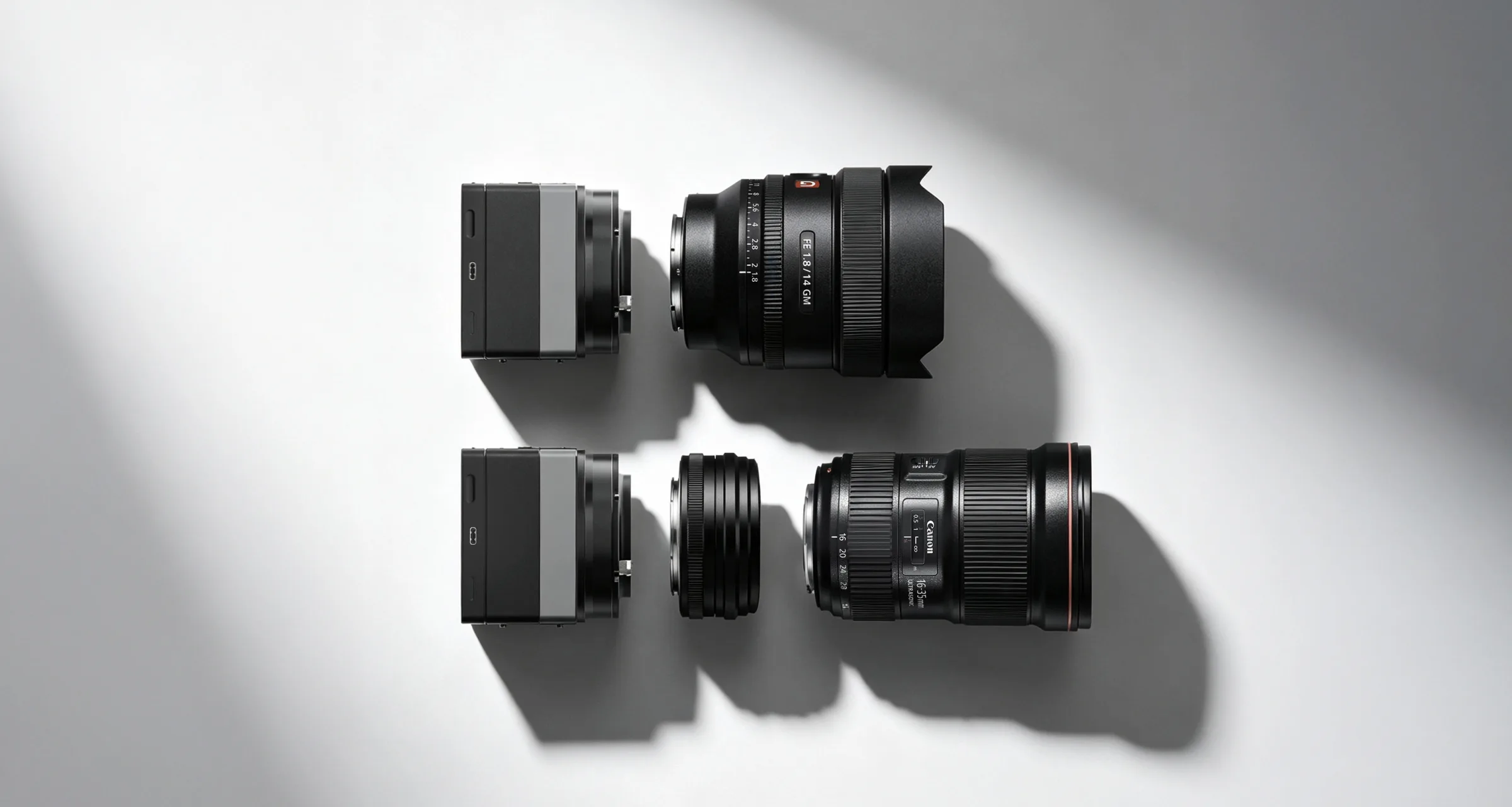 ArcBlue C42 camera body aligned with Sony and Canon camera lenses